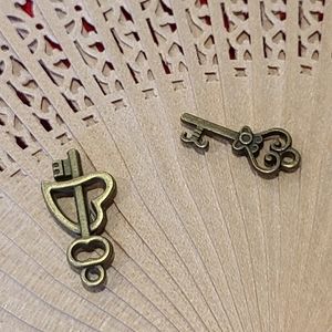 Two key charms for sale